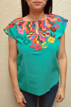 Magia Mexica Mexican Embroidered Blouses Women Blouse multicolored handmade by Mexican artisans. Measurements: ↕ 23 in ↔ 20 in WARRANTY We use what is needed to make your item arrives 100% safe and intact to your address. SHIPPING & DELIVERY TIMEFRAME We ship your order within 1-2 days after purchase USA: *Free Shipping USA 15-20 business days *Standard: 1 week * Express: 3 days Rest of the World: *Standard 4-6 weeks * Express: 5 days Every order is shipped within 1 business day Including IN Artisan Embroidered Summer Top, Artisan Embroidered Tops For Summer, Cinco De Mayo Multicolor Cotton Tops, Multicolor Cotton Tops For Cinco De Mayo, Bohemian Green Top With Embroidered Neckline, Multicolor Tops For Cinco De Mayo Festival, Multicolor Top For Cinco De Mayo Festival, Folk Multicolor Embroidered Tops For Cinco De Mayo, Folk Style Multicolor Embroidered Top For Cinco De Mayo