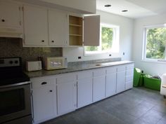 the kitchen is clean and ready for us to use in its new owner's home