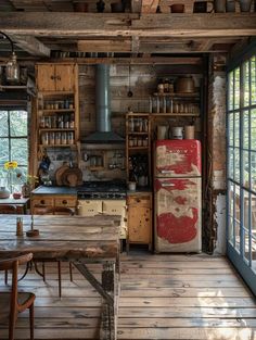 an old fashioned kitchen with wooden floors and walls