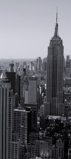 black and white photograph of the empire building in new york city, ny taken from above