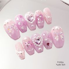 Nothing but love 💕 For the girls who love a soft and delicate aesthetic, meet our Sheer Love press on nail set  This nail set features an ethereal pink and purple background with lovely pearls, ribbons, and heart charms. All feminine with glitter and sequins set the mood for romance. It's the perfect gift for special someone, your BFF or even for yourself. This set is a ✨𝐬𝐡𝐨𝐫𝐭 𝐜𝐨𝐟𝐟𝐢𝐧 𝐧𝐚𝐢𝐥✨ 📦 What's in the complementary nail kit? -- Press on nail set -- 24 adhesive tabs -- Mini nail file  -- Mini nail buffer -- Manicure plastic stick -- Alcohol pads 🎀 How to measure? 🎀 Before ordering nails, please refer to my size chart! Measure across your nail bed with a piece of tape/paper/tape measure and then remove it and measure with the ruler on the cm side. If you would like to Nails Girly, Pink Press On Nails, Coquette Nails, Cute Pink Nails, Nothing But Love, Fake Nails Designs, Cute Coquette, Nails Cute, Short Coffin Nails