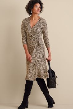 The wrap dress has been a style staple for years and it's no wonder – the lines are just so flattering. Our designers love the look and wanted to design something with our signature softness. This faux wrap is made from a ribbed stretch knit that's so comfy and forgiving. Adjust the wrap to your liking with the faux tortoise ring closure. 3/4 sleeves. | Fabric Care: 62% Polyester, 33% Viscose, 5% Spandex, , . Machine Wash Cold Separately, Inside Out, Gentle Cycle, Only , Non-Chlorine Bleach When Tortoise Ring, Soft Surroundings Dresses, Kick Flare Jeans, Suede Dress, Crochet Skirt, Mid Dresses, Print Tunic, Soft Surroundings, A Style