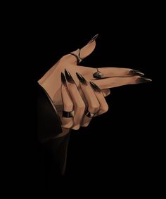 a woman's hand with black and silver stiled nails on it, against a black background