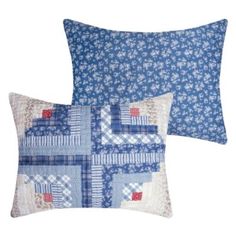 two blue and white pillows with different designs on the front, one is made out of fabric