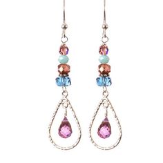 Sweet, delicate Julie. Always feminine, our Julie style earring features cascading vivid gemstones down to a delicate caged teardrop. Length: 1.75″ Sterling Silver Wire Wrapped Crystal Earrings, Wire Wrapped Dangle Linear Earrings, Teardrop Dangling Charms Jewelry For Party, Wire Wrapped Long Drop Linear Earrings, Nickel-free Dangle Teardrop Earrings, Teardrop Chandelier Earrings With Dangling Charms As Gift, Long Drop Teardrop Earrings With Dangling Beads, Wire Wrapped Teardrop Earrings For Party, Teardrop Pendant Chandelier Earrings As Gift