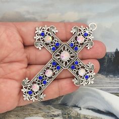 You will receive 1 - Ornate Large Silver Cross Charms with Blue and Clear AB Crystal Accents in Antique Silver Pewter by TIJC. These charms are a quality Silver for all your jewelry and crafting projects! - (1) Silver Cross Pendant - 87x67x7mm ( 25.4mm = 1 inch ) - Quality Pewter - Item # SP1628 Crystal Cross Pendant All Items will come as shown in a poly bag! WE ARE LOCATED IN TEXAS. WHICH MEANS YOU RECEIVE ITEMS QUICKLY IF IN THE U.S! WE ALSO SHIP INTERNATIONALLY All items are shipped after pa Manager Table, Crystal Cross, Silver Cross Pendant, Beaded Cross, Christian Cross, Poly Bags, Cross Charms, Pendant Silver, Silver Cross