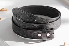 --- Leather Belt Width: 1.5" --- Premium Full-Grain Leather. --- Belt thickness 3.2 mm --- Easy Snap System for Interchanging Buckles --- Each product is one-of-a-kind and made from part of a whole hide of leather. The frontside is smooth and finished while the backside contains the grain fibers that indicate a true leather product. There will be unique variation from item to item that truly makes it your own.  The Perfect Fit: ---  Take an old belt (that still fits) and measure from the base of Western Style Brown Belt With Engraving, Engraved Leather Western Belt, Western Brown Engraved Belt, Brown Artisan Belt With Antique Buckle, Southwestern Hand-tooled Brown Belt Buckles, Handmade Leather Belt, Cow Hide, Leather Belt, Full Grain Leather