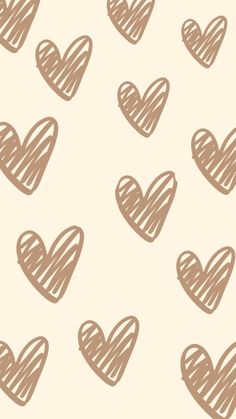 several hearts drawn in brown on a white background