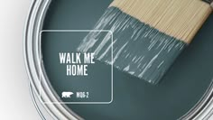 a paint can with a brush in it and the words walk me home painted on it