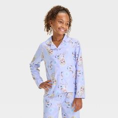 Your child will love to get ready for magical journeys through winter wonderlands in this 2-Piece Disney Frozen Pajama Set. This pajama set includes a long-sleeve button-down pajama shirt and pull-on pajama shorts, both crafted from 100% polyester fabric for all-night comfort. Designed in a light purple hue, both pieces feature allover Elsa and Olaf graphics with snowflake accents for a fan-favorite look. Elsa And Olaf, Cozy Pajamas, White Headband, Pajama Pant, Pajama Robe, Kids Outfits Girls, Purple Hues, Disney Girls, Pajama Shirt