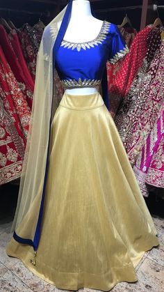 Royal Blue and Gold Bridesmaid's Lehenga Our bridesmaids outfits can be customized in multiple colors and specific to client measurements. They require 90 days of production time and are for bulk orders only! Orders are processed in store only! Minimum Order Quantity- 4 pieces Blue And Golden Lehenga, Bridesmaids Outfits, Golden Lehenga, Wallpaper Glitter, Golden Saree, Bridesmaid Lehenga, Gold Bridesmaids, Half Saree Designs, Royal Blue And Gold