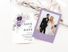 wedding save the date cards with purple flowers and greenery