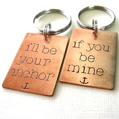 two key chains with words on them that say i'll be your anchor and if you