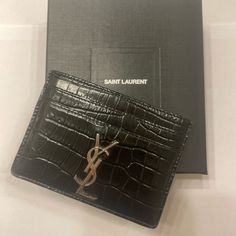 Ysl Black Croc 5 Card Holder With Dust Bag, Box, And Original Tag Minor Wear At Bottom Corners 2 Front/ 2 Back/ 1 Middle Card Slots Bags Ysl, Saint Laurent Bags, Yves Saint Laurent Bags, Card Slots, Yves Saint Laurent, Slots, Saint Laurent, Dust Bag, Card Holder