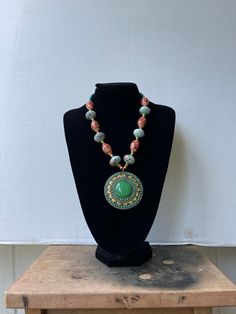 Umlazi Green African Necklace by DenkaysByPerline on Etsy Round Beaded Costume Jewelry Necklaces, Beaded Round Costume Jewelry Necklaces, Turquoise Round Beaded Necklace For Gifts, Round Turquoise Necklace With Large Beads For Gift, Adjustable Beaded Necklace With Large Pendant, Green Beaded Necklace With Large Pendant For Gift, Green Beaded Necklaces With Large Pendant For Gift, Green Beaded Necklace With Round Pendant, Beaded Medallion Necklace For Festivals