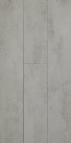 an image of a white wall that looks like concrete