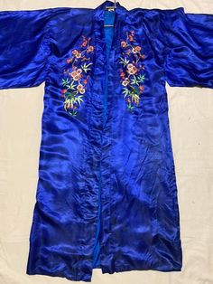 This item is in good vintage condition with minor age related changes such as fading and  Stain.plz look at pictures carefully . Traditional Silk Kimono For Festivals, Traditional Spring Wedding Kimono, Long Vintage Kimono For Festivals, Traditional Long Kimono With Floral Embroidery, Long Sleeve Silk Robe For Festival, Silk Kimono With Floral Embroidery, Traditional Embroidered Robe With Kimono Sleeves, Traditional Long Sleeve Blue Robe, Traditional Long Wedding Robe