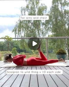 a woman in red doing yoga on a deck with the caption for arm and chest