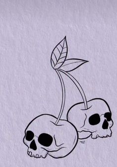 two skulls with leaves on their heads and one skull holding a flower in its mouth