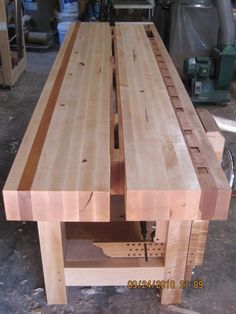 a workbench made out of wood in a workshop