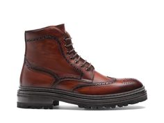 The Daroca is a casual wingtip boot. Featuring our supple calfskin leather, this comfortable boot utilizes brogue wingtip detailing to set it apart from the rest. The Daroca features a cushioned rubber lug sole finished with an extended leather welt for a perfect casual boot aesthetic. Leather Wingtip Work Boots With Brogue Detailing, Wingtip Work Boots With Leather Sole, Business Wingtip Boots With Vibram Sole, Classic Formal Lace-up Boots With Lug Sole, Calf Leather Wingtip Boots For Fall, Fall Calf Leather Boots With Wingtip, Calf Leather Wingtip Boots For Work, Wingtip Boots, Comfortable Boots