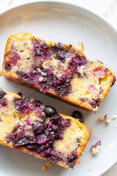 two slices of blueberry bread on a white plate