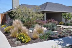 a house with landscaping in front of it