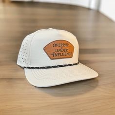 Need a hat to wear on the range to make all of your golf buddies jealous? Look no further. "Over Par and Under the Influence" written in the *iconic* Master's Font is perfect for the golf course or let's be honest, everywhere. It pairs nicely with the water resistant "Hydro" style hat as well to keep you cool as a cucumber in this scorching heat. Go ahead and click add to cart. You know you want to. FYI All 258 and 112 are Richardson Brand hats. All Hydro hats are from Lonestar. Fun Hats, Cool As A Cucumber, Golf Hat, Golf Hats, Under The Influence, Cool Hats, Small Family, Golf Course, Mississippi