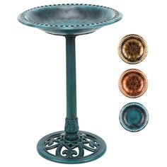 an outdoor pedestal with three different colors and designs on the sides, including two circular medallions