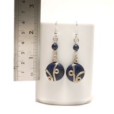 These handmade Wire Wrapped Lapiz Lazuli Earrings unique piece you are holding was made by hand especially for you... These Silver Earrings are simply stunning and perfect for livening up an everyday outfit. I can offer matching necklace and bracelet. My other pieces here: https://www.etsy.com/shop/BeyhanAkman My Lapis Earrings is coated with a durable clear non-toxic polymer to prevent tarnishing and oxidation formation. You'll receive this in a lovely gift wrapped box. I can include a handwrit Pierced Sterling Silver Beaded Earrings As Gift, Gift Sterling Silver Pierced Beaded Earrings, Adjustable Drop Wrap Earrings As Gift, Wire Wrapped Dangle Earrings For Gift, Blue Wire Wrapped Hoop Earrings For Gift, Wire Wrapped Earrings As Gift, Blue Wire Wrapped Hoop Earrings As Gift, Nickel-free Drop Wrap Earrings For Gifts, Handmade Silver-plated Wire Earrings