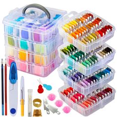 two plastic storage boxes filled with lots of different colored threads and needles next to each other