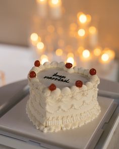 a white cake sitting on top of a table