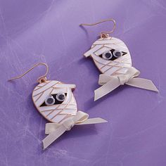 Mummy with Googly Eyes Halloween Hook Earrings - Mummy Figure Design - Playful Googly Eyes - Hypoalligic Titanium Earrings - Perfect to Wear for Halloween **Size: Approx. 1.75" Drop Length Halloween earrings evoke spooky charm with their themed designs. From miniature pumpkins to tiny ghosts, these accessories capture the playful spirit of the holiday. Whether subtly stylish or boldly themed, they add a whimsical touch to any Halloween ensemble, making them a delightful choice for both costume p Googly Eyes Halloween, Eyes Halloween, Scarf Coverup, Rebecca Black, Figure Design, Costume Parties, Titanium Earrings, Googly Eyes, Halloween Earrings