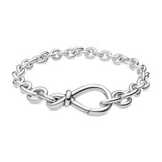 From Pandora, it's double the love with their unique interpretation of the infinity symbol. The iconic knot wraps around the asymmetrically-set center to signify the strength of the connection. This chunky sterling silver infinity knot bracelet is the perfect representation of an unbreakable bond and a classic addition to your bracelet collection. The infinity clasp opens and can be styled with up to two Pandora Moments dangle charms or pendants. This bracelet measures 7.1inches. Pandora Style # Classic Jewelry Pieces, Knot Bangle, Infinity Knot, Bracelet Knots, Sterling Silver Charm Bracelet, Sparkle Earrings, Pandora Bracelets, Bracelet Collection, Pandora Jewelry