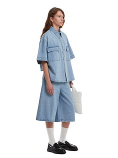 Editor's NotesTRUNK PROJEST's oversized denim shirt features a shirttail hemline. Make your outfit with this denim shirt trendy and casual.- Button closure- Spread collar- Flap pocket- Shirttail hem- Non-stretchy cottonMeasurements(in.)XXS/XS/S/L- Total length: 23.62 / 24.40 / 25.19 / 26.77 in.- Shoulder: 16.92 / 17.71 / 18.50 / 20.07 in.- Chest: 22.83 / 23.62 / 24.40 / 25.98 in.- Sleeve: 7.87 / 8.66 / 9.44 / 11.02 in.Model infoWoman - Height: 5'74 Fitting size LComposition & Care- 100% Spring Medium Wash Denim Top With Buttoned Pockets, Spring Denim Top With Buttoned Pockets In Medium Wash, Chambray Denim Top With Pockets, Short Sleeve, Short Sleeve Chambray Denim Top With Pockets, Spring Button-up Denim Top With Frayed Hem, Light Wash Denim Shirt With Pockets, Summer Collared Denim Jacket In Relaxed Fit, Casual Oversized Shirt With Flap Pockets, Denim Blue Relaxed Fit Top With Patch Pockets