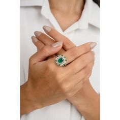 This stunning 18k white gold cocktail ring features a brilliant princess-cut emerald, complemented by sparkling diamonds. The exquisite craftsmanship highlights the vibrant green of the emerald, creating a timeless elegance perfect for any special occasion. A statement piece that embodies luxury and sophistication, this ring is a must-have for jewelry enthusiasts. Emerald enhances intellectual capacity of the person.  Designed with octagon and round cut emerald set with diamonds that makes it a perfect fit to wear it on your wedding or style it with any of your basic outfit to give it a glam. This is a perfect Emerald Wedding Cocktail Ring. This is a perfect May Birthstone Jewelry also perfect Grandma Gift, Valentine Gift, Gift For Mom, Wedding Gift, Engagement Gift, Mother Daughter Gift, Emerald Cocktail Ring, Emerald Set, Princess Cut Gold, Diamond Cocktail Ring, Mother Daughter Gifts, Emerald Wedding, Mom Wedding, Gold Cocktail Ring, Wedding Cocktail