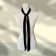 Black velvet skinny scarf; an extra long and thin unisex mod style scarf/tie to complement your outfit for a retro sixties look. It is handmade in quality velvet and available two lengths 74" long x 1.5" wide and 84" long x 1.5" wide Super long for a statement and fashionable look that can be worn several ways Will double as a belt, bag tie or neck bow too! Care...warm wash and cool iron, air dry, do not tumble **SEE MY SKINNY SCARF SECTION FOR MORE STYLES AND SIZES** shipping within 1 - 3 days Scarf Tie, Elegant Scarves, Style Scarf, Mod Style, Neck Bow, Scarf Tying, Mod Fashion, How To Make Shorts, Fashion Mode