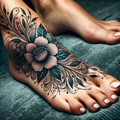 a woman's foot with flowers and leaves on the top part of her body