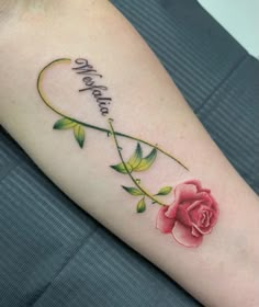 a rose with the words welcome home on it and an arrow in the shape of a heart