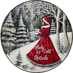 a plate with a woman in a red dress and santa hat walking through the snow