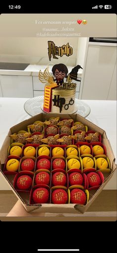 a box filled with lots of cookies on top of a table