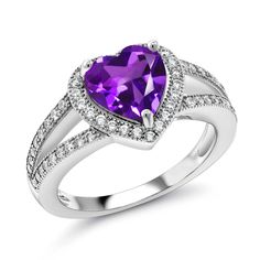 PRICES MAY VARY. Exquisite Purple Amethyst Gemstone: This ring showcases an exquisite 8MM heart-shaped purple amethyst gemstone as its focal point. With a total carat weight of 2.31, the amethyst exhibits a rich purple hue and exceptional clarity, creating a captivating and eye-catching ring. Sparkling White Moissanite Accents: The ring is adorned with sparkling white moissanite accents that beautifully complement the purple amethyst gemstone. The moissanite stones add a touch of brilliance and Purple Heart Rings, Purple Rings, February Birth Stone, Moissanite Ring, Gem Stone, Moissanite Rings, Amethyst Stone, Sterling Silver Heart, Amethyst Gemstone