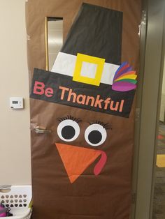 a door decorated to look like a thanksgiving turkey