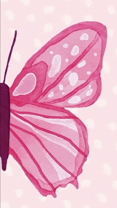 a pink butterfly with white spots on it's wings