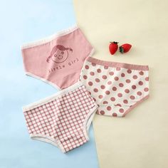 Discover the ultimate comfort and adorable style for your little girl with our Girls Underwear 3-Pack! These panties are designed with your child's comfort in mind. Available in seven delightful collections, each pack features a variety of charming designs, including floral patterns, cute grids, and playful dots, ensuring a fresh and fun choice for every day of the week. Imagine the smile on your daughter's face when she wears these lovely briefs, designed with both style and comfort in mind. Each pair is crafted to provide a snug, yet gentle fit, allowing her to play and move freely without any discomfort. The durable and soft cotton material ensures long-lasting wear and easy care, making these underpants a practical choice for busy parents. Order your Girls Kawaii Underwear 3-Pack today Pink Cotton Kawaii Sets, Cute Stretch Cotton Bottoms, Cute Cotton Stretch Sleepwear, Cute Pink Cotton Diaper Cover, Cute Stretch Cotton Sleepwear, Cute Pink Bottoms For Playtime, Cute White Brief Bottoms, Stretch Pink Cotton Sets, Pink Stretch Cotton Sets