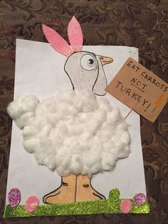 this is an image of a turkey made out of cotton floss and paper mache