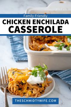 chicken enchilada casserole on a plate with a fork next to it