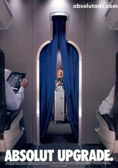 an advertisement for absolut upgrade on the inside of a plane