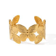 Transform Your Look with Elegance and Style Elevate your ensemble with our stunning Stainless Steel Butterfly Big Open Bracelet. Crafted with precision and designed to dazzle, this bracelet exudes elegance and sophistication. Features: High-quality stainless steel construction for durability 18K gold PVD plating for a luxurious finish Trendy butterfly design adds a touch of whimsy Waterproof for everyday wear Easy-to-wear cuff style Perfect for casual or sporty occasions Benefits: Elevates any o Butterfly Items, Chunky Cuff Bracelet, Chunky Gold Bracelet, Bracelet Stands, Floral Cuff Bracelet, Butterfly Cuff, Bracelet Easy, Dragonfly Bracelet, Floral Cuff