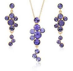 ' Featuring eye-catching purple round Austrian crystals. This cascading design of necklace earring set offers the right amount of sophistication.     Chain length 18" +2" extender ; pendant 1.65" drop  Earrings 1.5" drop  18K Italian Rosegold Plated  Lead/Nickel Free  Comes in a gift box.       ' Luxury Purple Necklace For Gift, Luxury Purple Necklaces For Gifts, Luxury Purple Necklaces For Gift, Luxury Purple Cubic Zirconia Necklace, Luxury Purple Jeweled Necklace, Luxury Purple Crystal Jewelry, Luxury Purple Elegant Crystal Necklaces, Luxury Purple Crystal Elegant Necklace, Luxury Unique Purple Necklaces